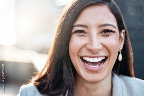 Happy, portrait and businesswoman in city for career, opportunity and exited for job. Corporate female person, smile and laughing for promotion, success and startup company in downtown New York