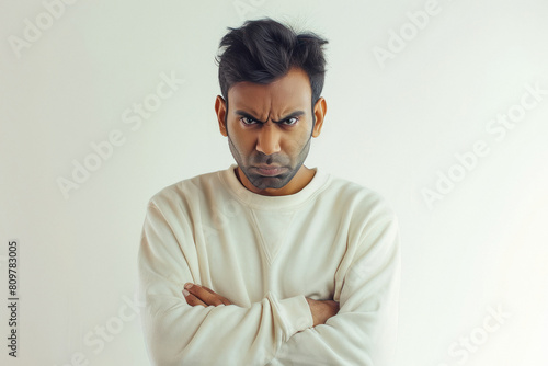 Indian man wearing sweatshirt and he is very angry