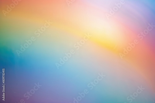 Rainbow pastel background with sunshine glare.