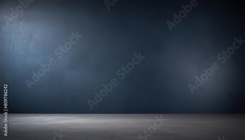 Empty dark blue abstract cement wall and studio room with smoke float up the interior texture for display products wall background