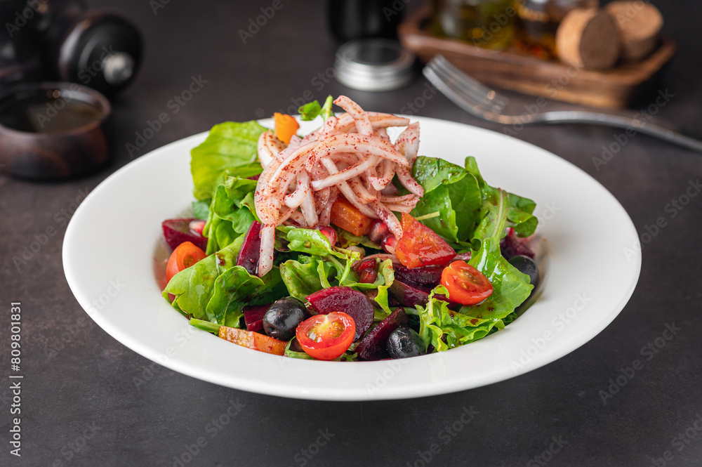 Closeup of fresh salad with herbs and vegetables Closeup of fresh salad with herbs and vegetables