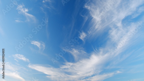 Cloud cirrus nature with skyscrapers. Nice weather and environment concept. Timelapse. photo