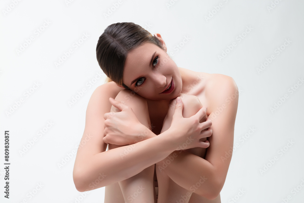 Vulnerable strength defines her beauty, entirely naked Vulnerable strength defines her beauty, entirely naked