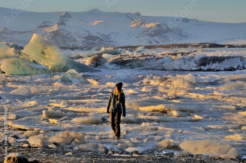 Woman walking on the Glacier in Iceland