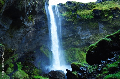 Waterfall Surrounded by Green Nature in Iceland. Selijalandsfoss