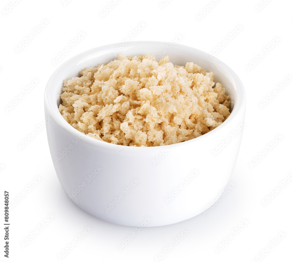 Panko bread crumbs in a bowl isolated on white background. With clipping path. Panko bread crumbs in a bowl isolated on white background. With clipping path.
