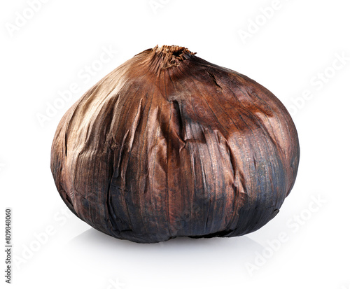 Black garlic bulb isolated on white background. With clipping path. © vitals