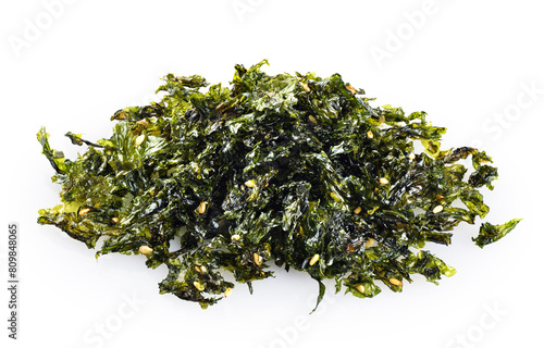 Kim Jaban dried seaweed sprinkles with sesame seeds isolated on white background. With clipping path. photo