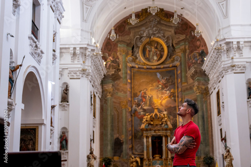 Slika na platnu In the solemn silence of the church, his contemplative gaze reflects a myriad of