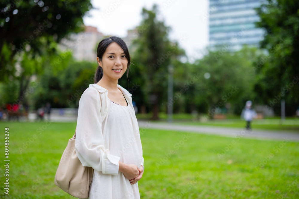Pregnant woman at the park