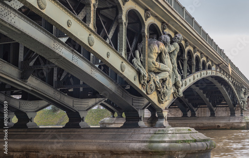 Detail of Sculptures decorating the two level bridge Bir Akime (Pont de Bir-Hakeim steel bridge) across the Seine River in Paris. Destinations in Europe. Space for text,