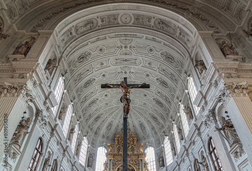 Jesus hanging on the cross, Crucifix in the interior of St. Michael's Church (Michaelskirche Jesuit church) in Munich pedestrian zone. It is the largest Renaissance church north of the Alps.Copy space