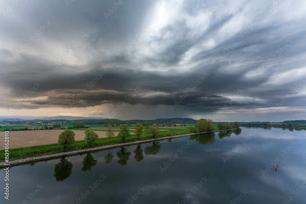 Supercell of a storm cloud over the Danube in the Landreis Straubing-Bogen Bavaria Germany. Supercell of a storm cloud over the Danube in the Landreis Straubing-Bogen Bavaria Germany.