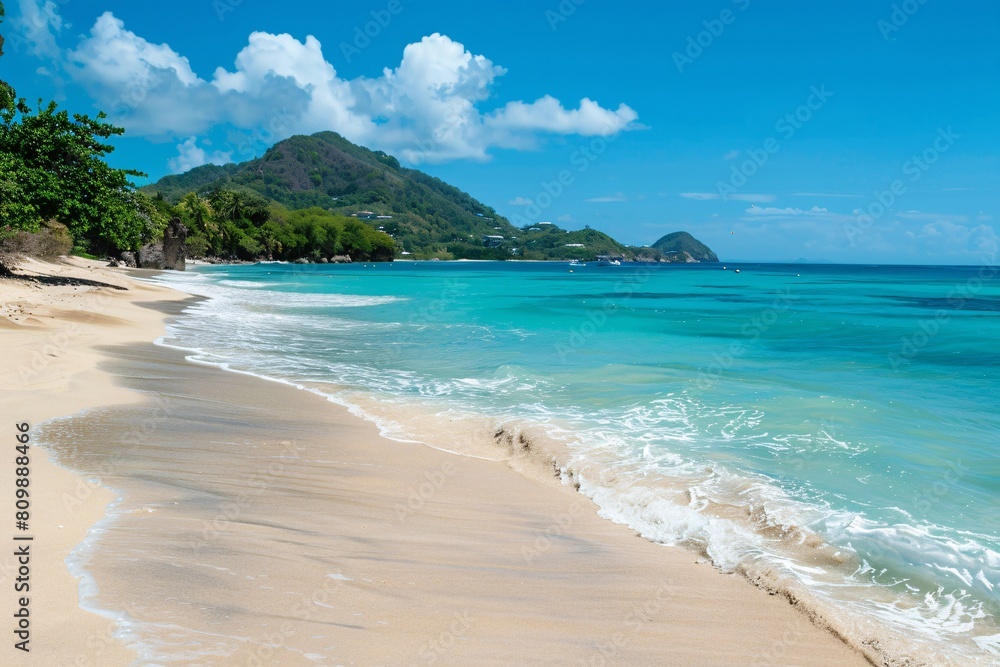 A serene coastal scene with a sandy beach and turquoise waters