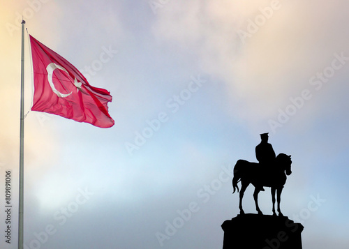 30th august victory day of Turkey or 30 agustos zafer bayrami background and Turkish flag with Monument of Mustafa Kemal Ataturk. photo