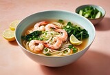 Tasty bowl of noodles with shrimp toppings, studio photo
