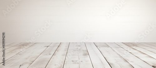 A copy space image of a wooden floor painted in white