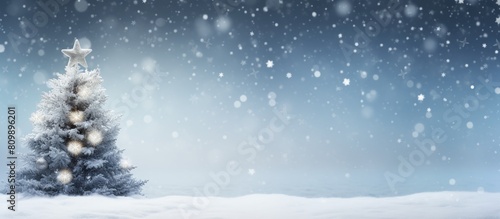 Christmas background featuring a festive Christmas tree adorned with a white star snow and pearls creating a beautiful copy space image