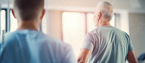 Senior man receiving physiotherapy during rehabilitation at the gym Copy space image
