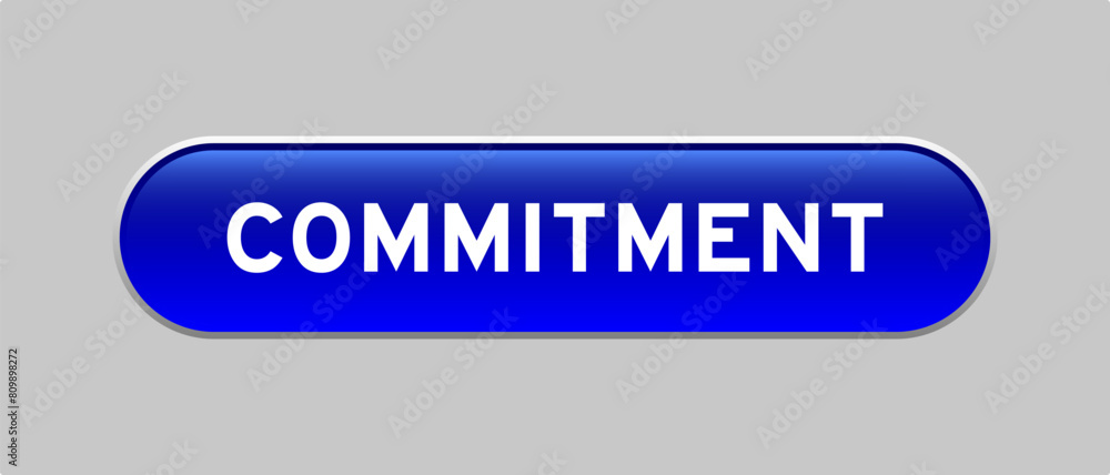 Fototapeta premium Blue color capsule shape button with word commitment on gray background