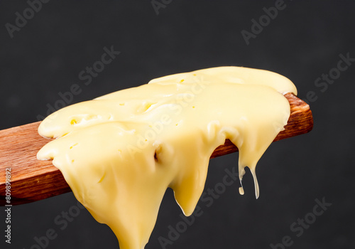 Close up cheese melting on spatula © musicphone1