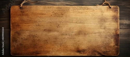 Antique wooden cutting board with copy space image on vintage background