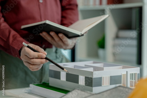 Bilde på lerret an architect is working in workplace with a lot of information that has to proce