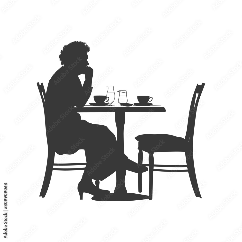 Silhouette elderly woman sitting at a table in the cafe Silhouette elderly woman sitting at a table in the cafe
