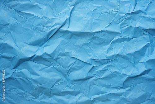 Blue crumpled paper texture , background