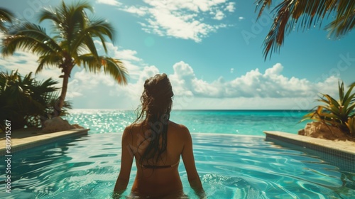 a woman in a bikini in the pool enjoying the summer sun on a Caribbean island, Generative AI © supinda