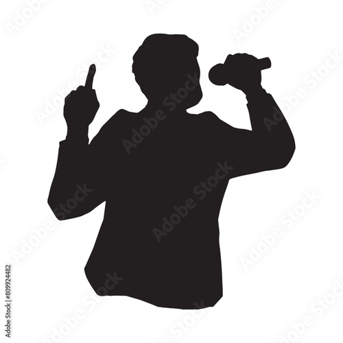 マイクを持って演説するあるいは歌を歌う男性のシルエットイラスト　黒