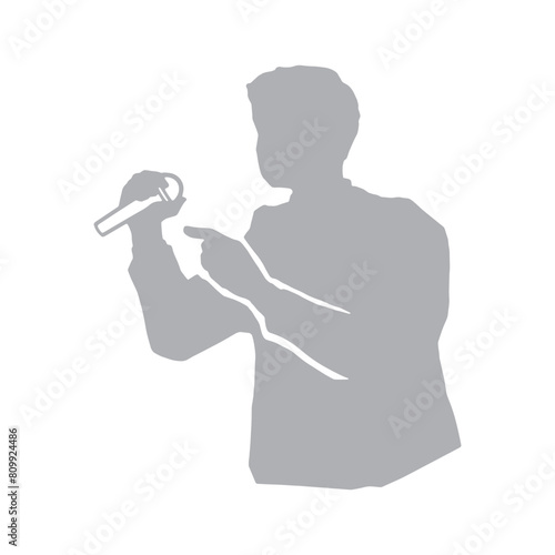 マイクを持って演説するあるいは歌を歌う男性のシルエットイラスト　グレー
