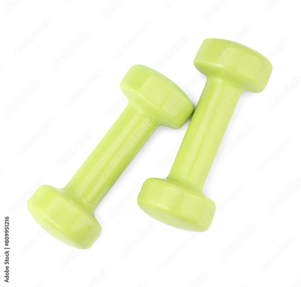 Light green dumbbells isolated on white, top view. Sports equipment Light green dumbbells isolated on white, top view. Sports equipment