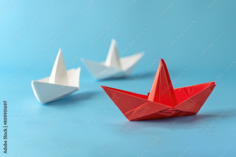 Paper boats floating on blue water, suitable for summer themes Paper boats floating on blue water, suitable for summer themes