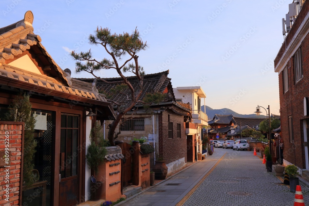 Jeonju Hanok Village quiet street in South Korea. Neighborhood of traditional Korean wooden architecture. Jeonju Hanok Village quiet street in South Korea. Neighborhood of traditional Korean wooden architecture.