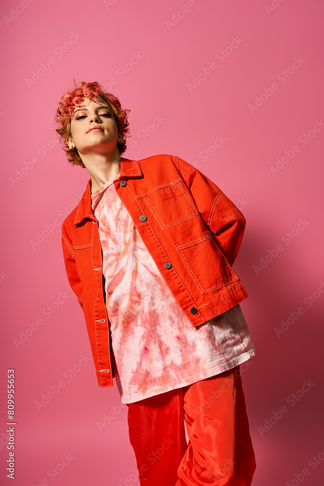 A stylish woman confidently donning a red jacket and red pants. A stylish woman confidently donning a red jacket and red pants.