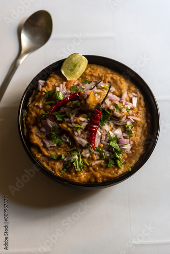 Indian popular food dal tadka curry  or lentil soup in a bowl. Close up, selective focus.