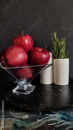red apple on a plate