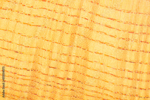 macro photo of a wooden background with a smooth and even texture.