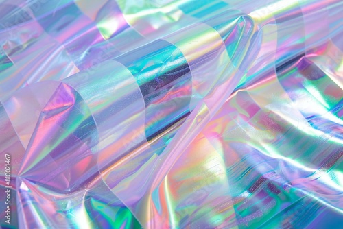 Abstract background of holographic foil in pastel colors with copy space