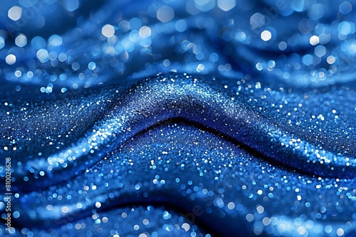 Blue shiny fabric texture background macro close up with bokeh lights photo
