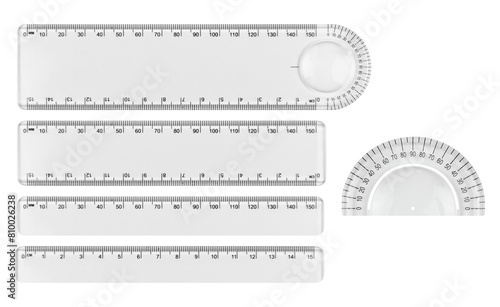 set plastic stationery ruler in centimeters and millimeters with protractor, isolated from background	 photo