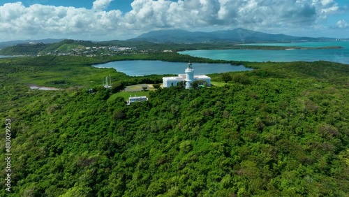 Aerial drone footage of the lighthouse at Fajardo, Puerto Rico, with the bioluminescent bay, and El Yunque mountains, in the background.
