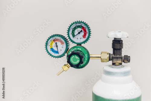 welding equipment acetylene gas cylinder tank with gauge regulators manometers. Pressure reducer. Gas cylinder equipment. Adjustment of the protective gas supply photo