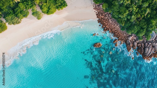 A stunning natural landscape featuring a beach lined with trees, surrounded by turquoise water. Perfect for a peaceful and relaxing travel destination AIG50