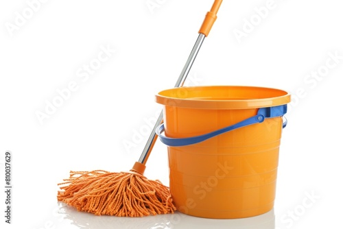 A mop and bucket on a clean white surface. Perfect for household cleaning ads