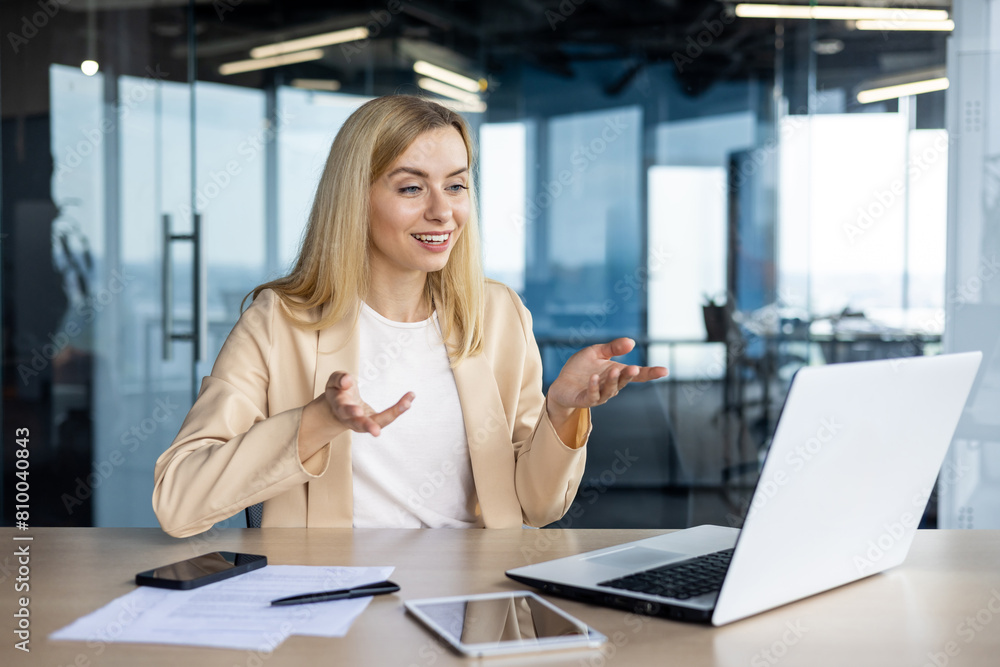 Professional businesswoman interacting during a virtual meeting Professional businesswoman interacting during a virtual meeting