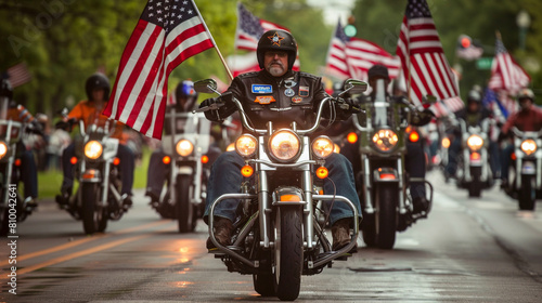 Overview of a Memorial Day motorcycle rally with veterans riding in formation American flags flying from the bikes.