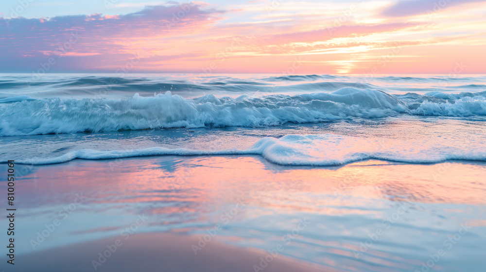 Obraz premium Pastel Sunset Over Gentle Ocean Waves, Serene Coastal Scene