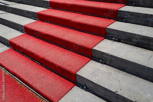 red carpet on the steps to the castle entrance